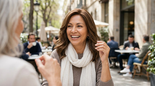 Confident woman wearing a long honey-blonde wig outdoors — everyday wig wearing made effortless with a professional wig cut.